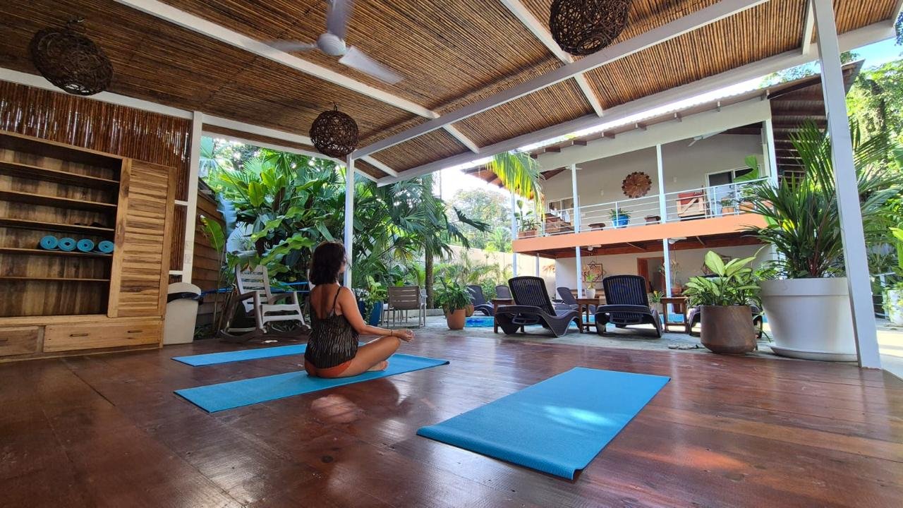 Gentle yoga and movement in open-air shala at Sanctuary Puerto Viejo